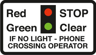 Miniature warning lights at a level crossing