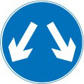 Vehicles may pass either side